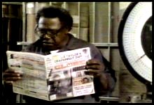 Postal worker that has tabloid in Yours Very Deadly